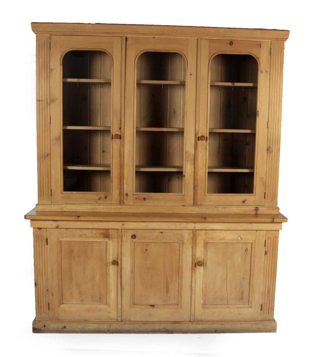 A pine library bookcase By Heals