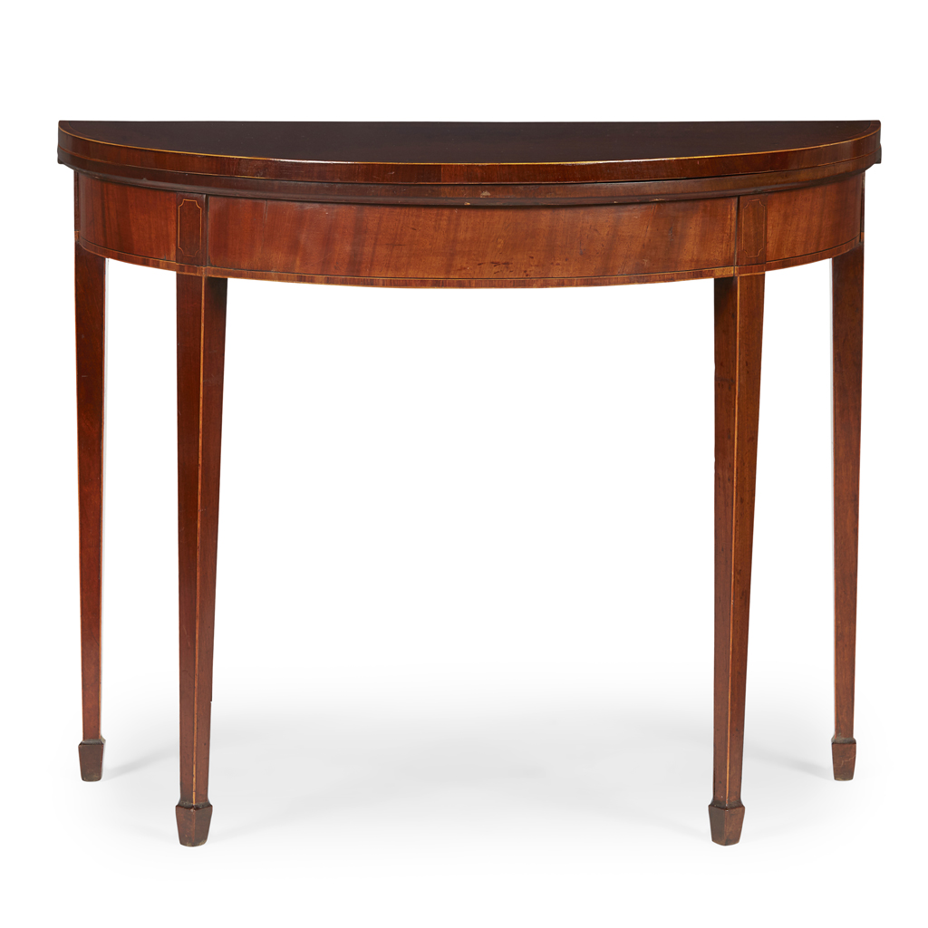 LATE GEORGE III MAHOGANY AND HAREWOOD DEMILUNE FOLD-OVER GAMES TABLE