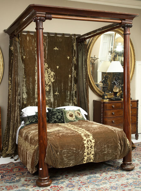 A Victorian mahogany four poster bed