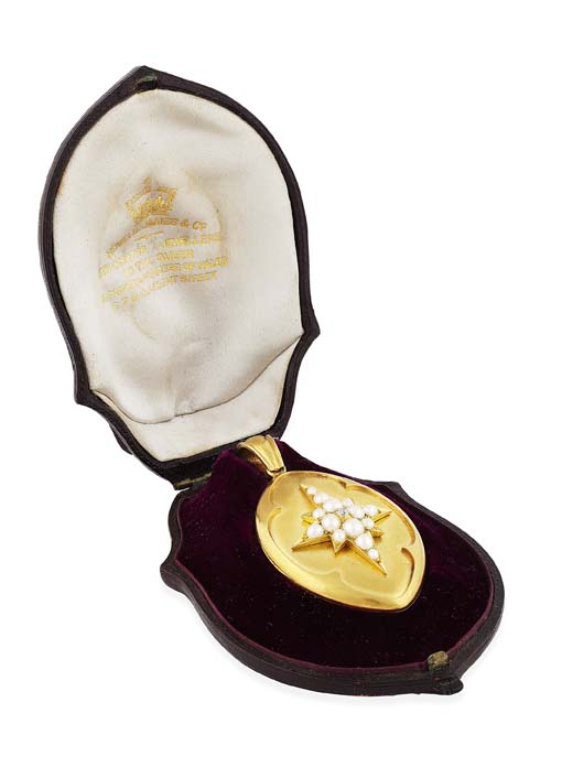 An early 19th century half-pearl and diamond set locket