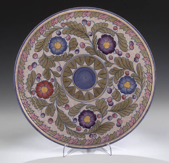 A Crown Ducal circular charger by Charlotte Rhead