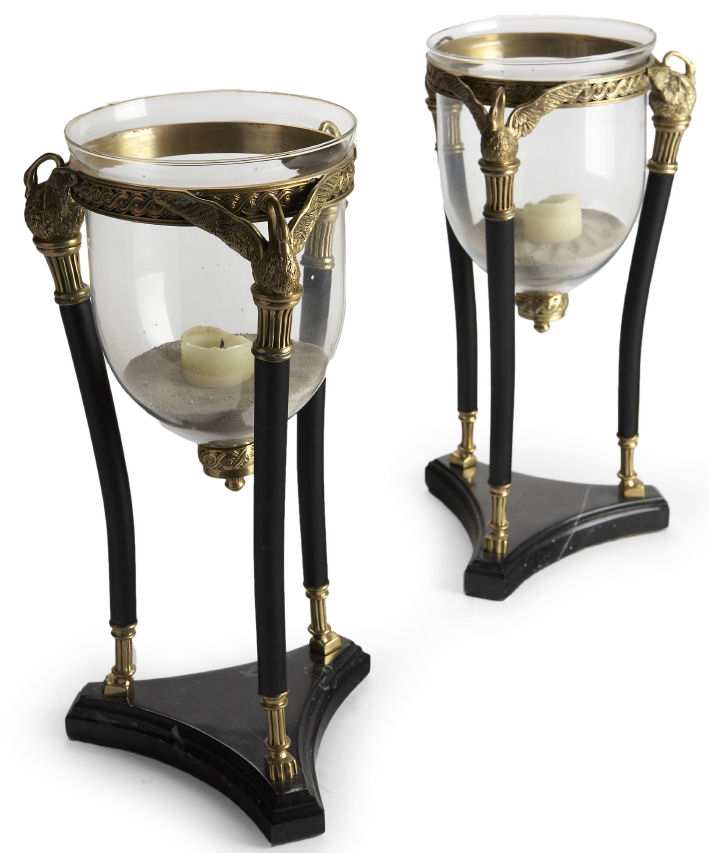 A pair of French Empire style gilt and patinated metal storm lamps