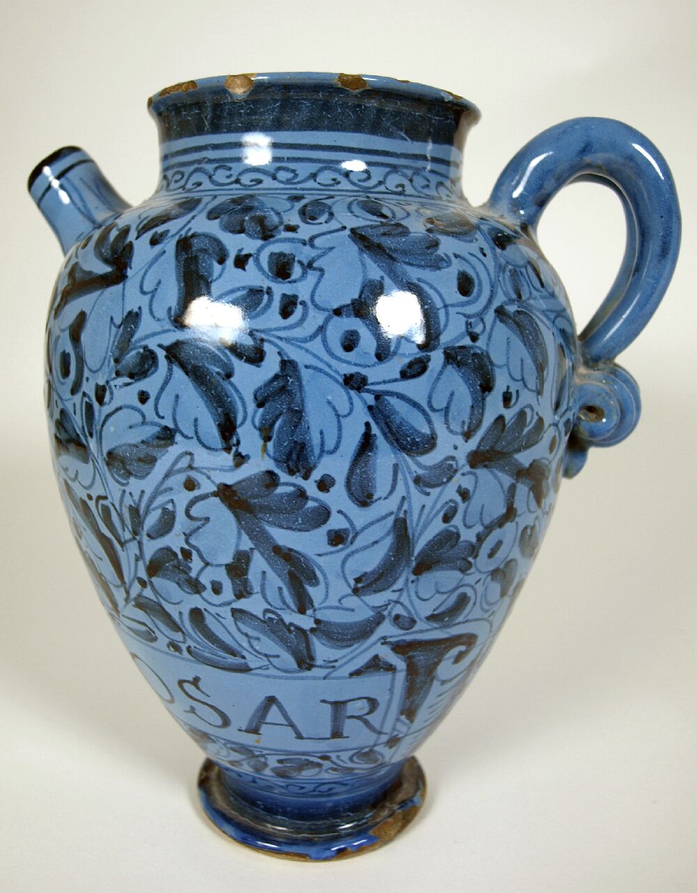 A late 16th century 'berettino' ground Venice maiolica syrup jar