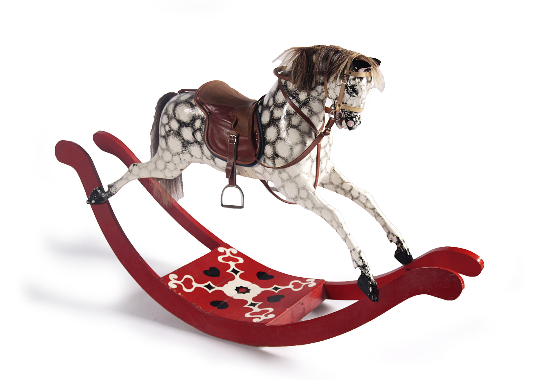 A DAPPLE PAINTED ROCKING HORSE