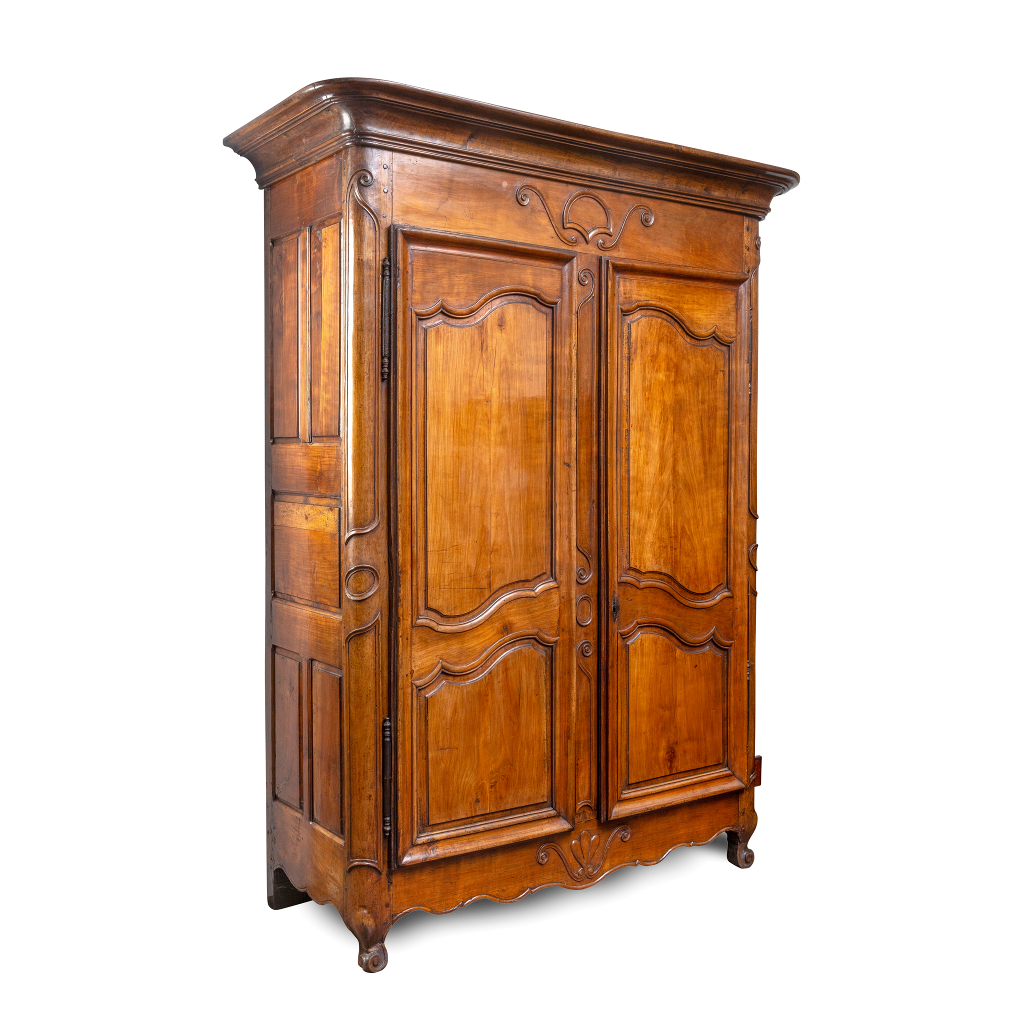 A LARGE LOUIS XV PROVINCIAL FRUITWOOD AND WALNUT ARMOIRE