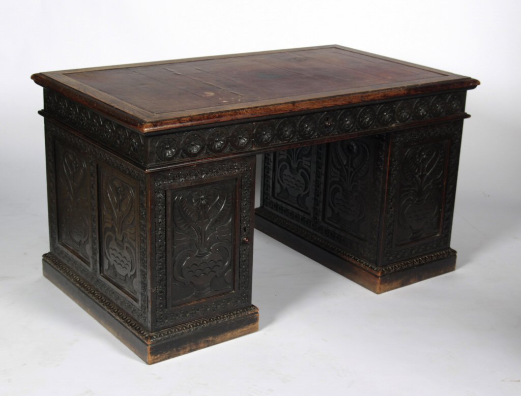 A Victorian carved oak desk Stamped 'G. Clist'