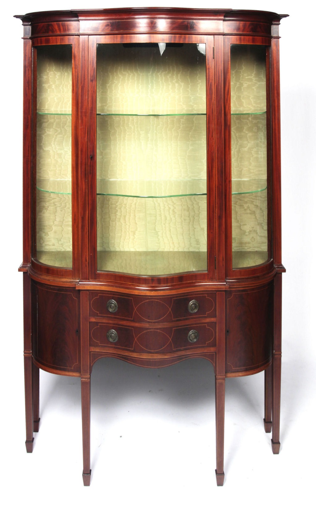 An Edwardian mahogany serpentine display cabinet