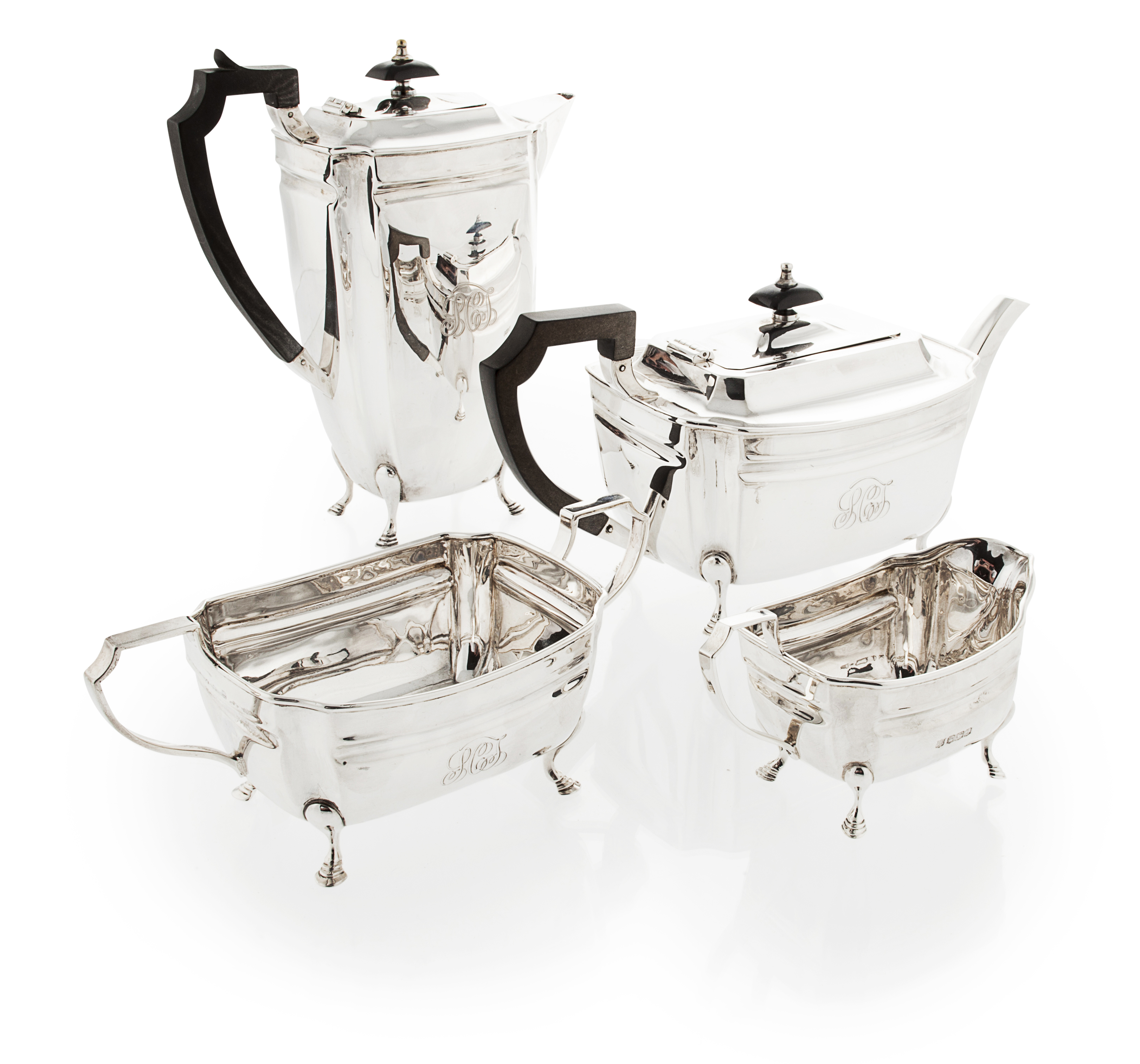 A matched four piece silver tea service