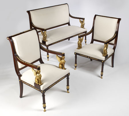 A 19th century mahogany and gilt metal mounted salon suite In the Empire taste