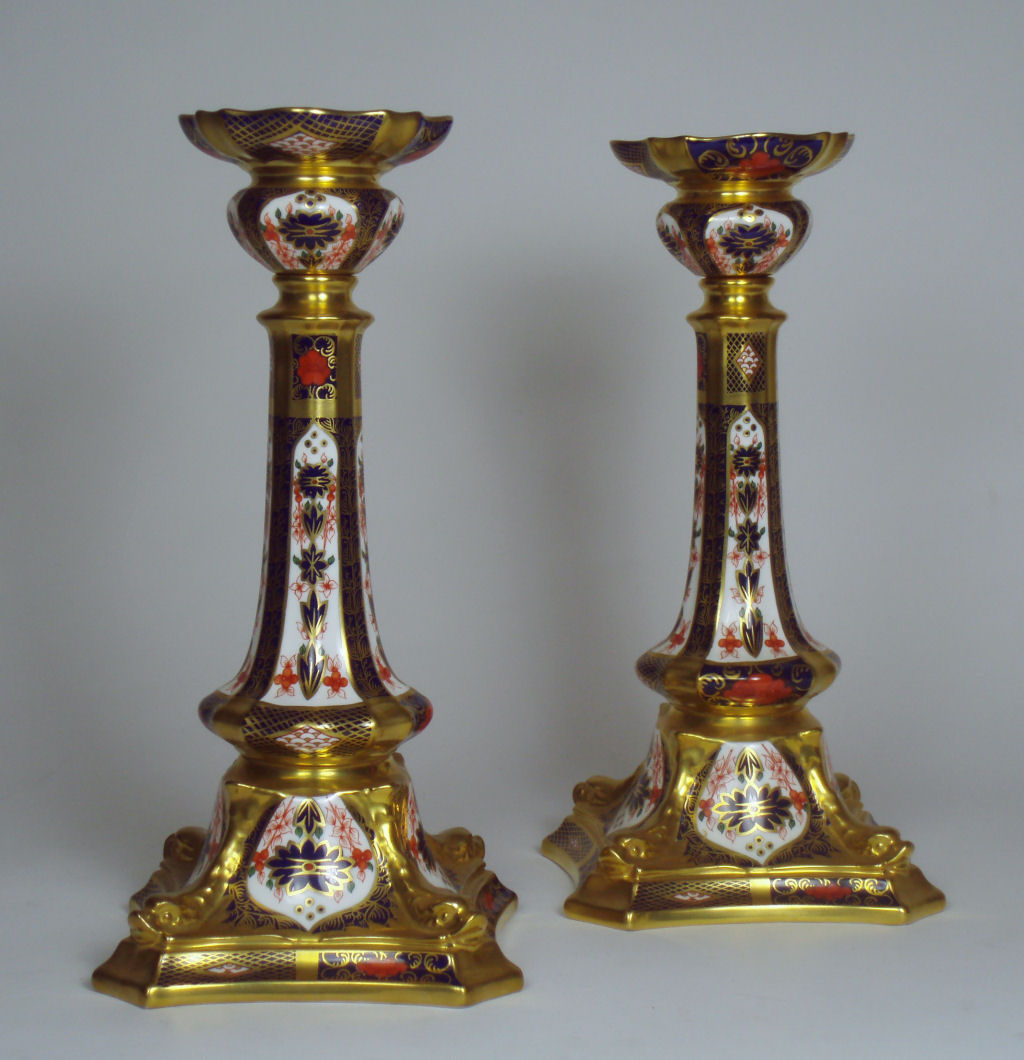A pair of Royal Crown Derby bone china candlesticks