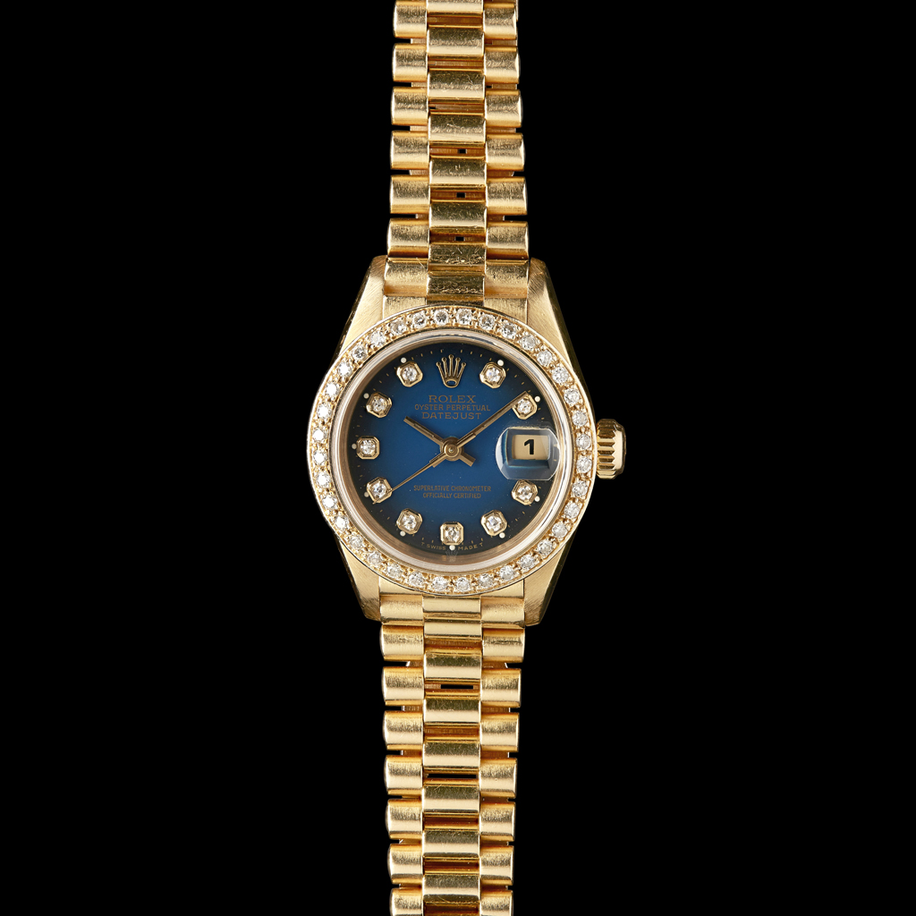 ROLEX - A lady's 18ct gold and diamond set wrist watch