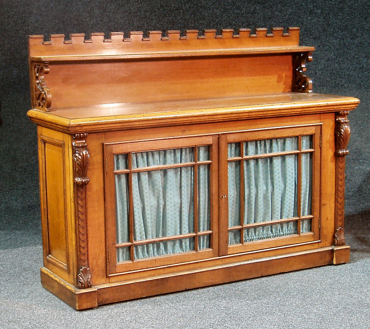 A Victorian oak sideboard