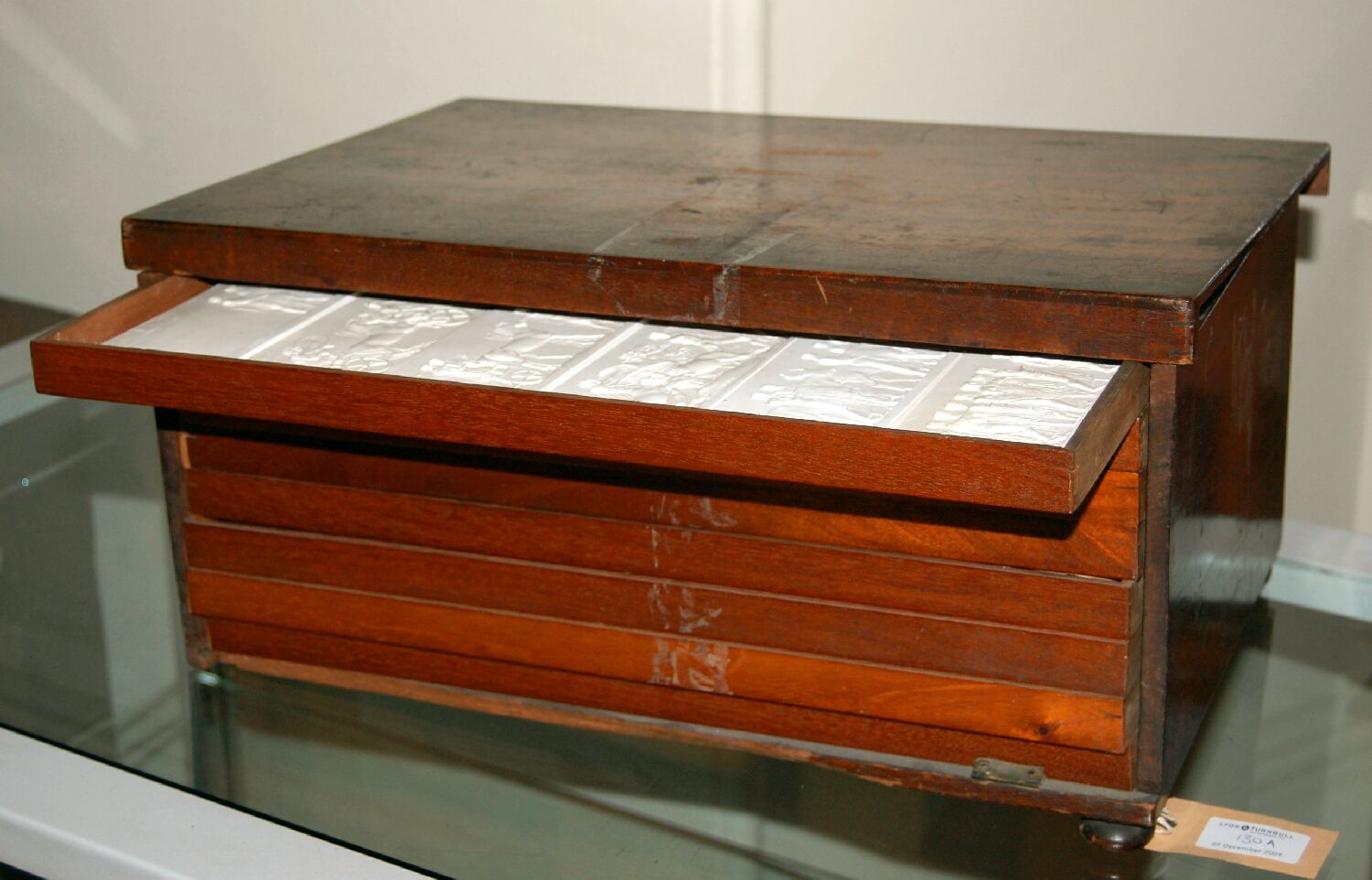 BOX CONTAINING PLASTER CASTS OF THE PARTHENON AND PHYGALIAN FRIEZE