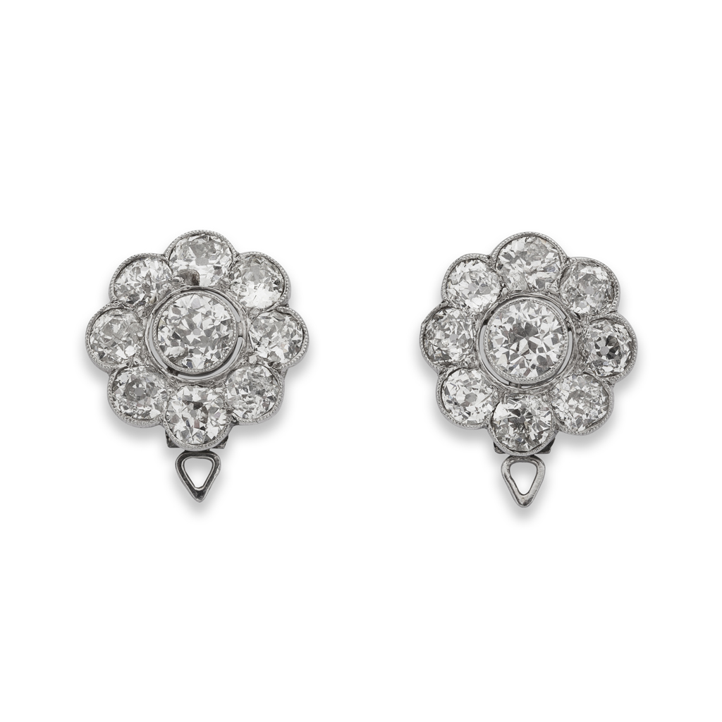 A pair of diamond cluster earrings