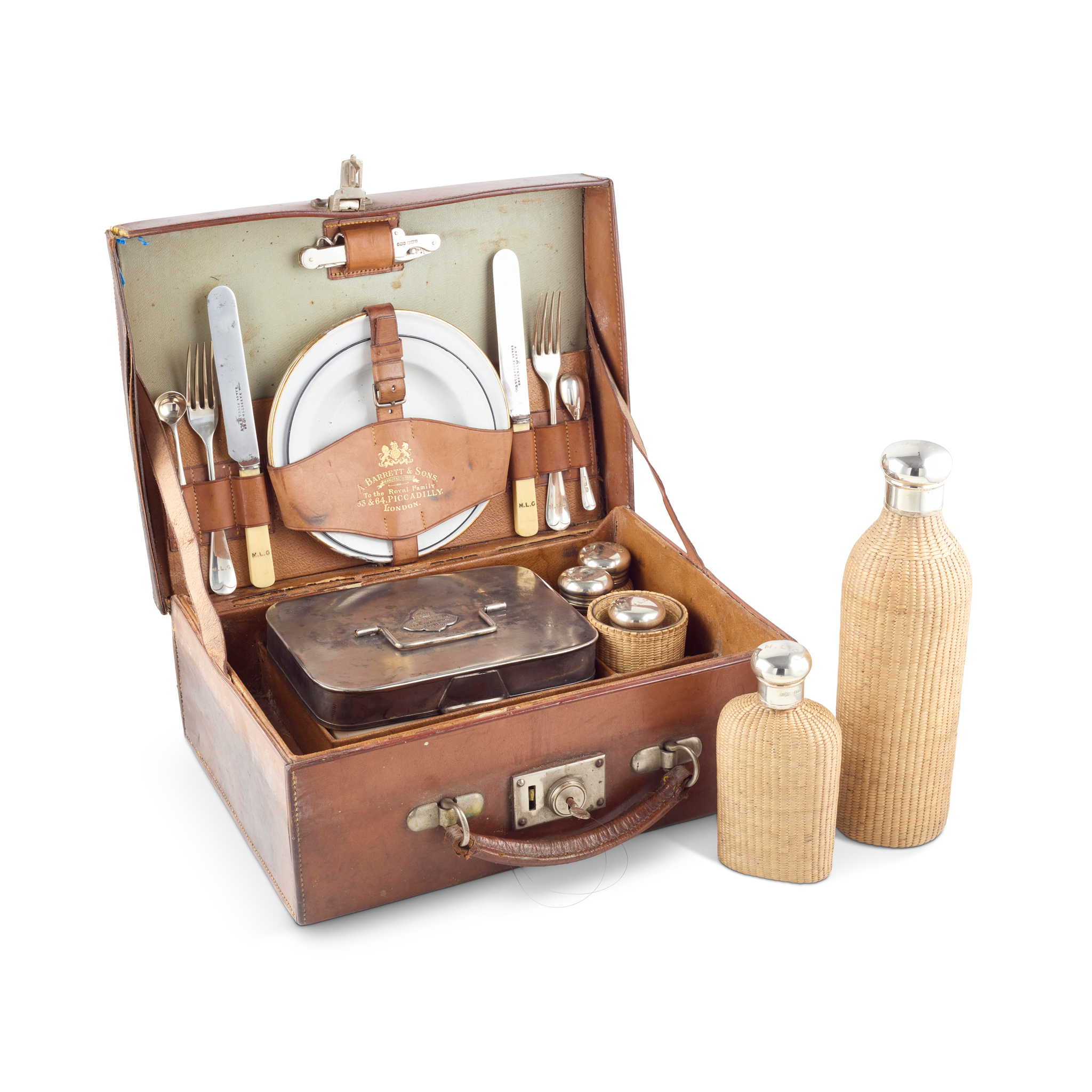 AN EDWARDIAN CASED TRAVELLING PICNIC SET FOR AUTOMOBILE TRANSPORTATION