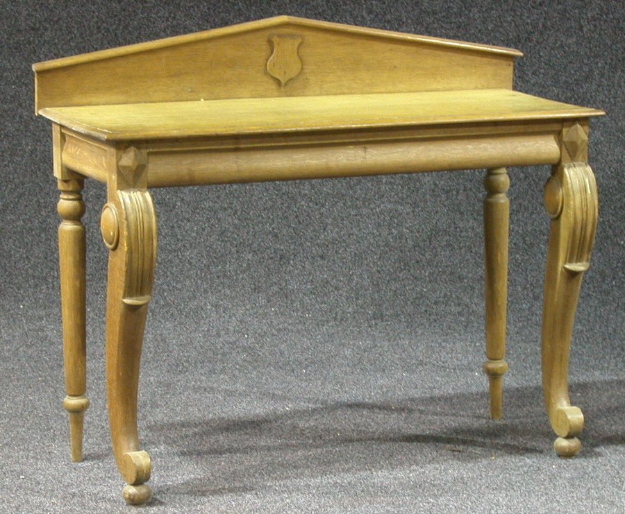 A mid 19th century oak library table,