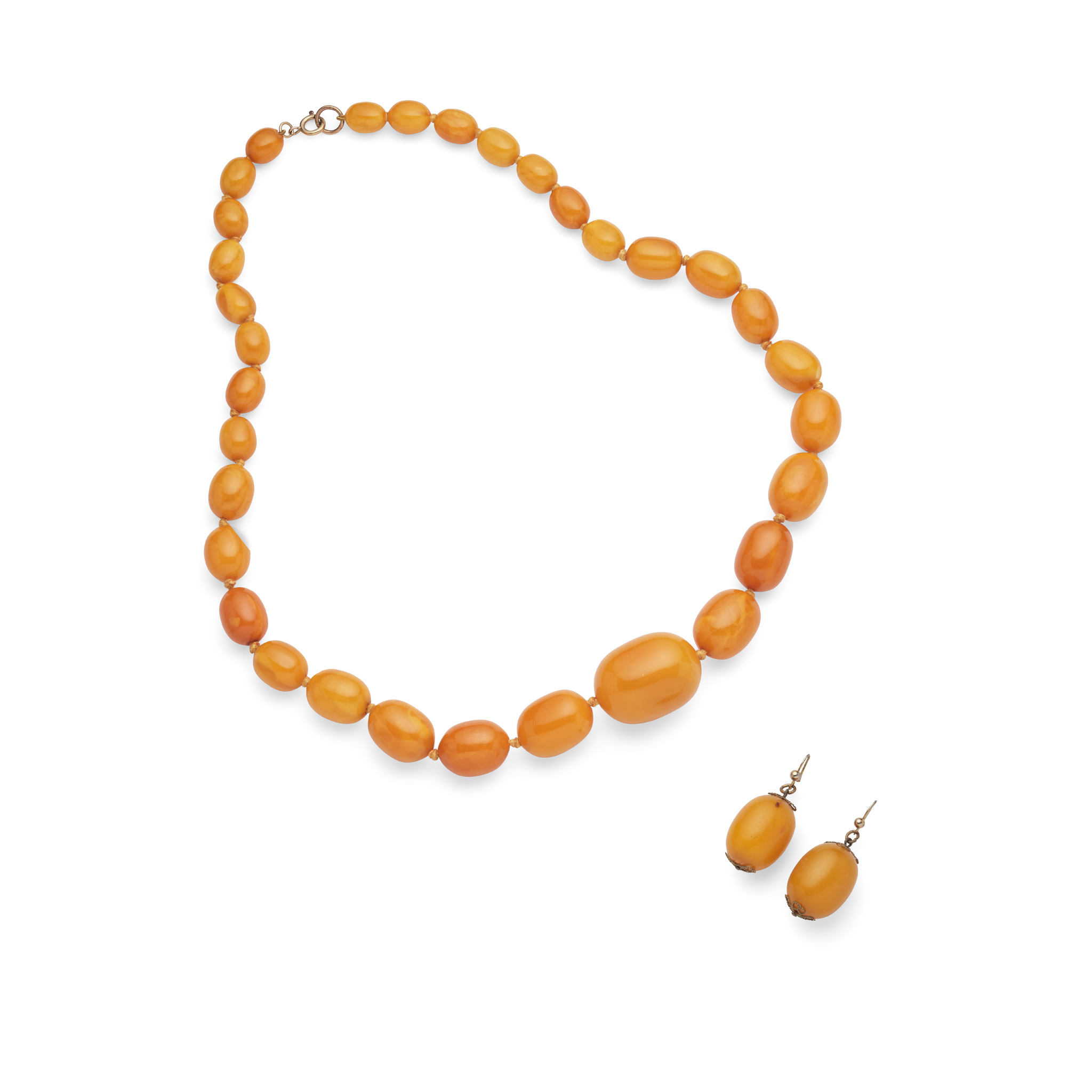 An amber bead necklace and matching earrings