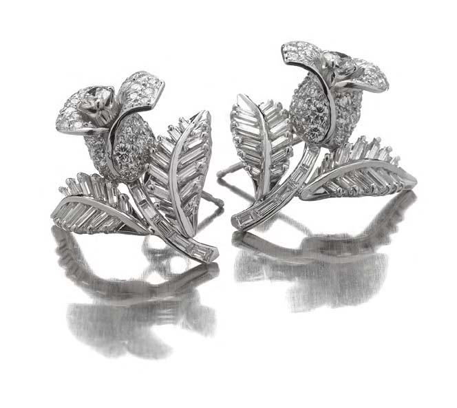 A pair of diamond cluster earrings,