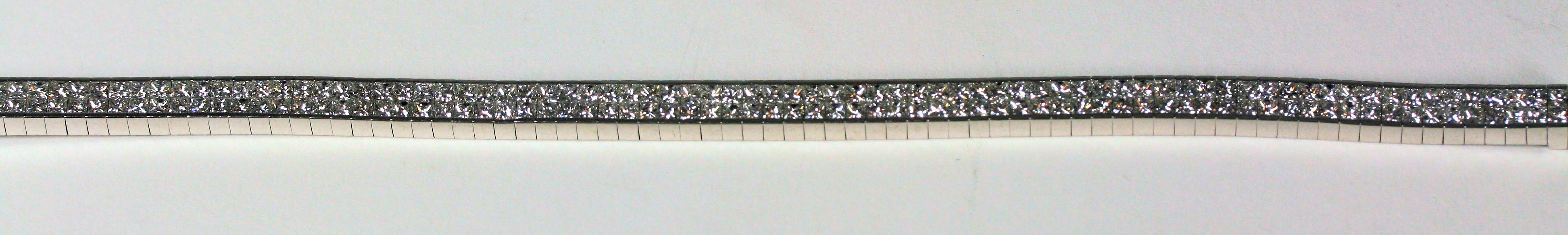 An 18ct white gold mounted diamond set bracelet