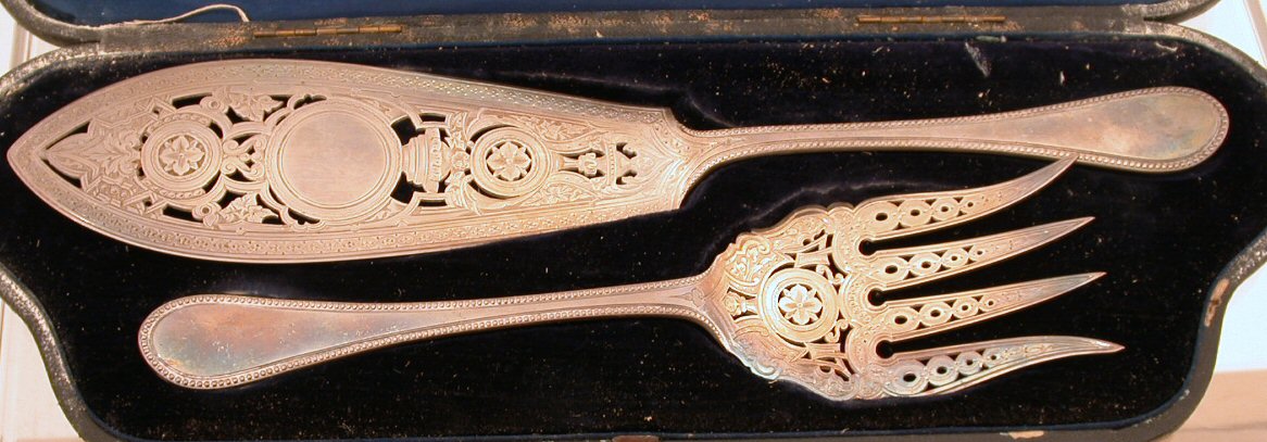 A cased pair of Victorian servers,