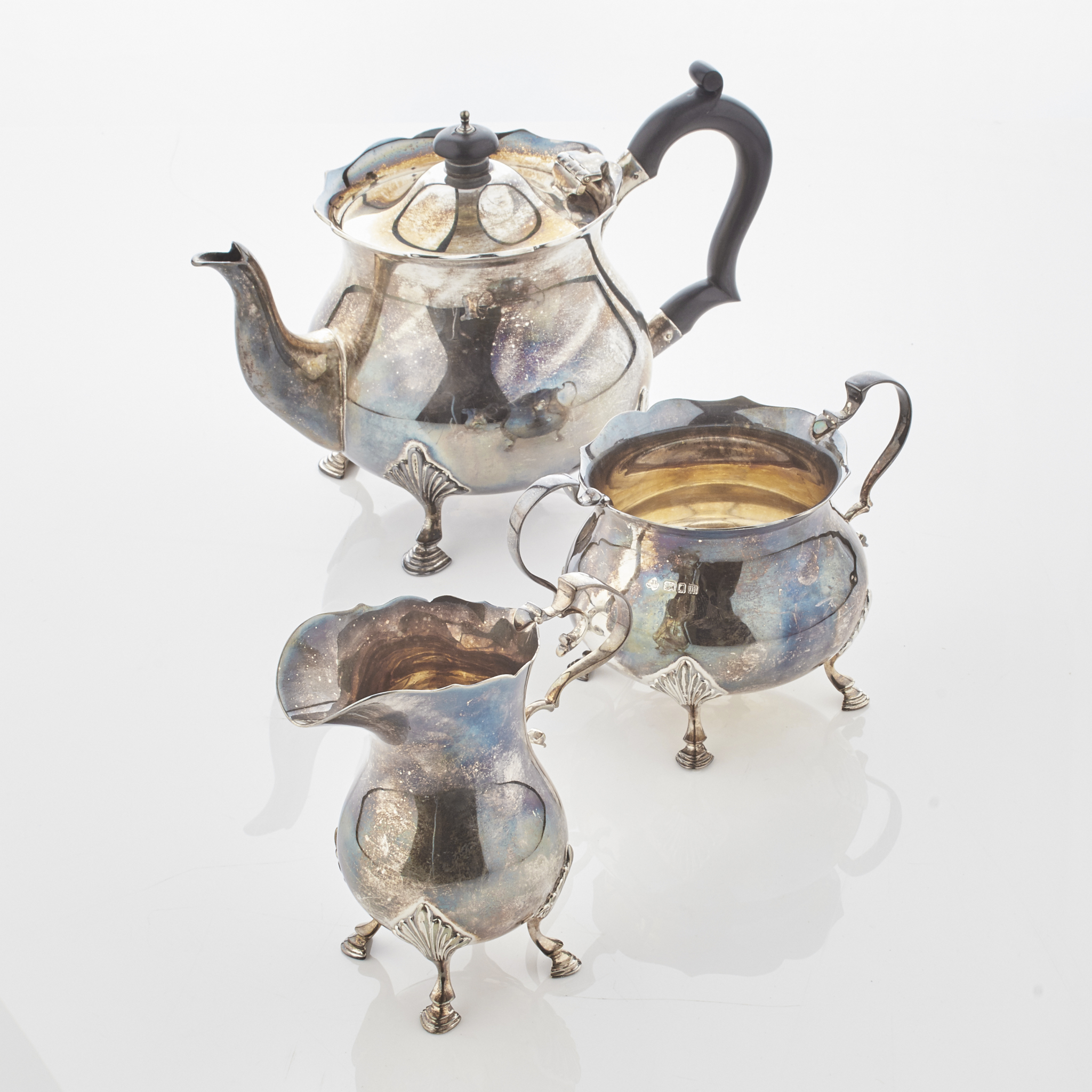 A three piece silver tea service