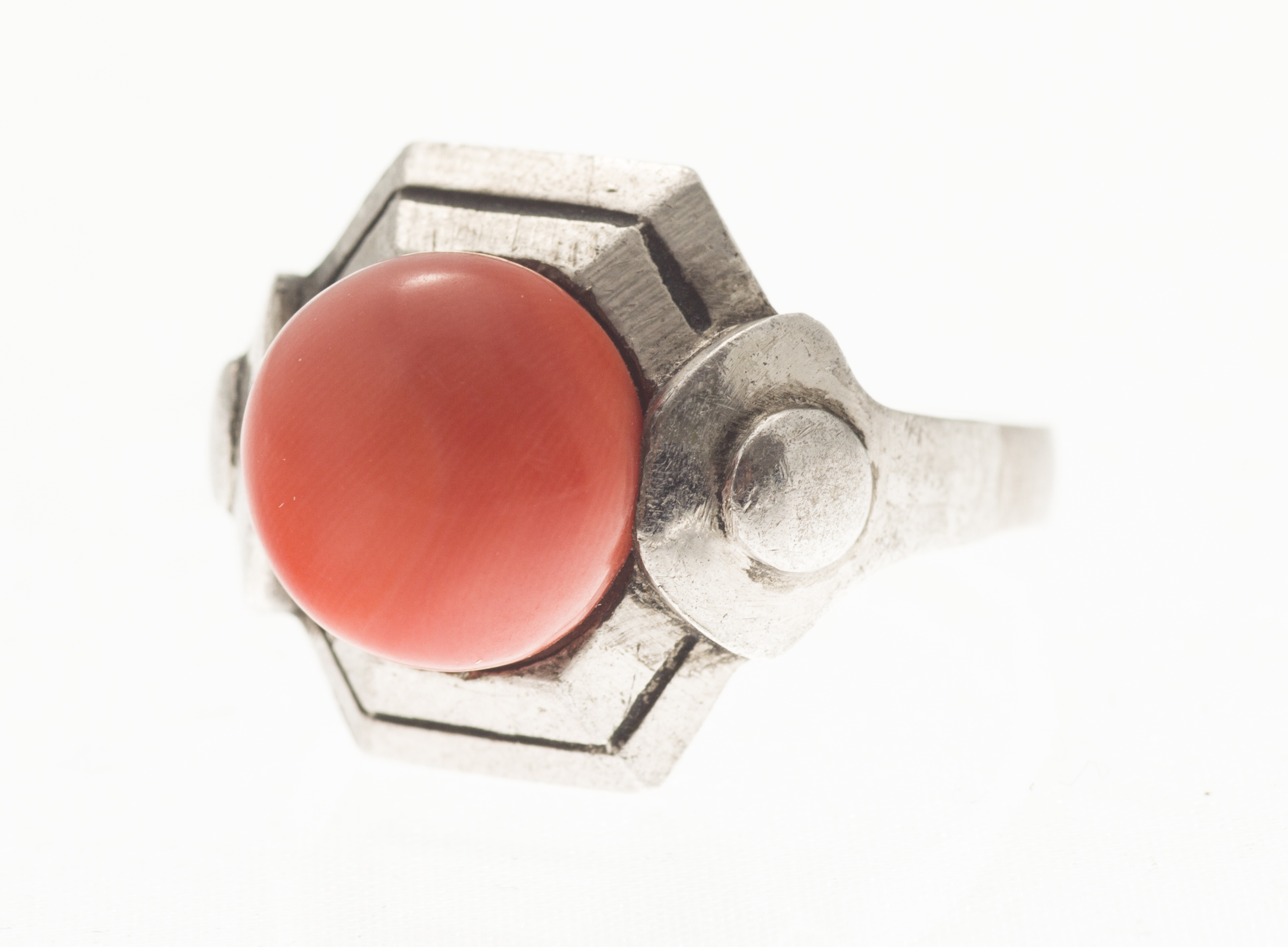 A 1920s coral set ring