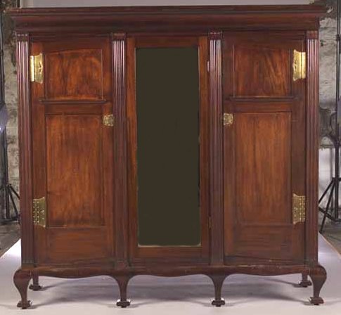An Art Nouveau mahogany wardrobe attributed to James Salmon