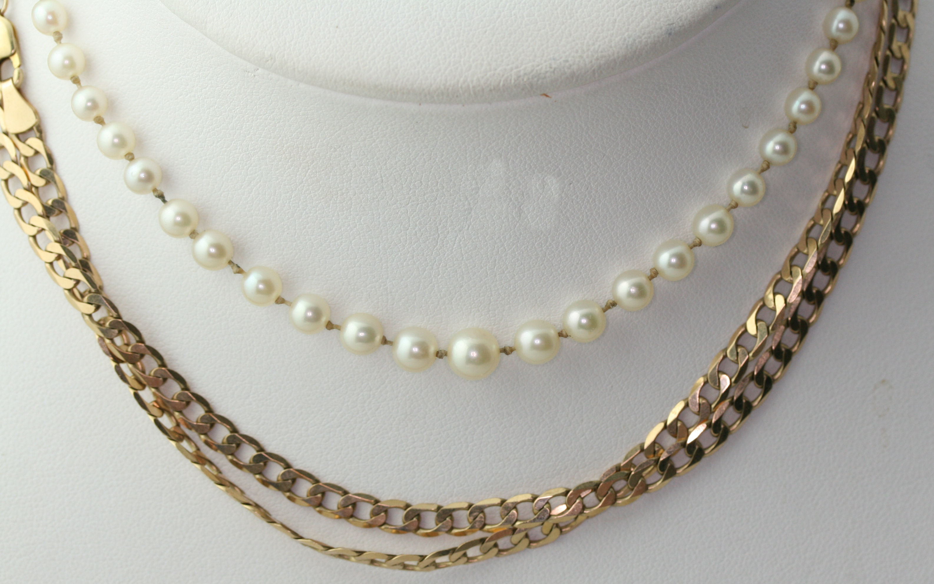 A group of jewellery to include a baguette cut diamond set bracelet