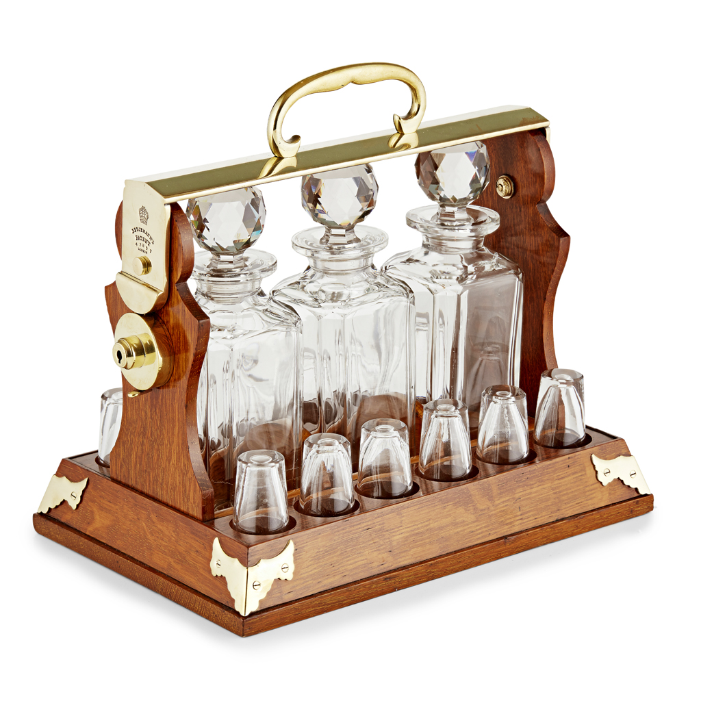 LATE VICTORIAN MAHOGANY BRASS MOUNTED TANTALUS, BETJEMANN'S, LONDON