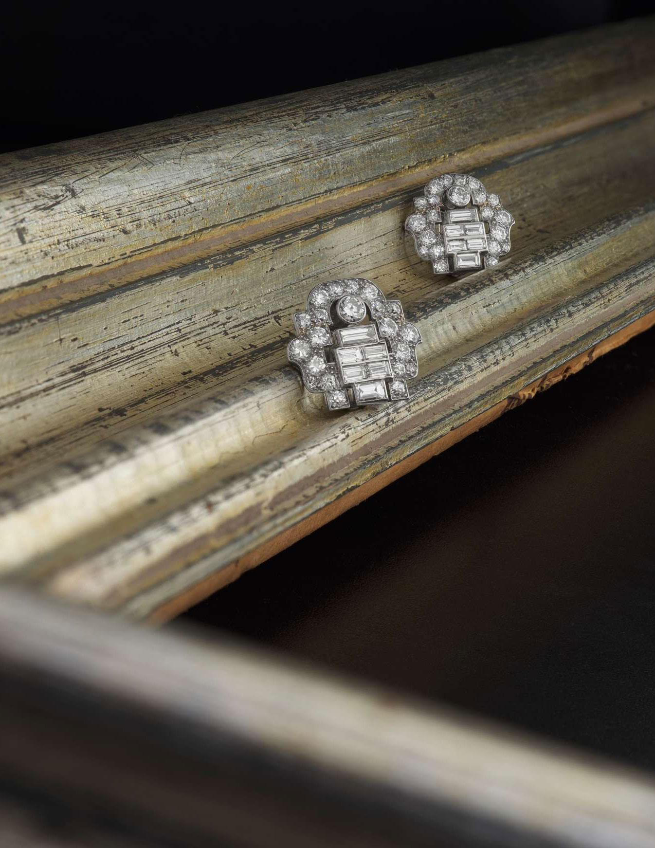 Cartier: A pair of Art Deco diamond earclips