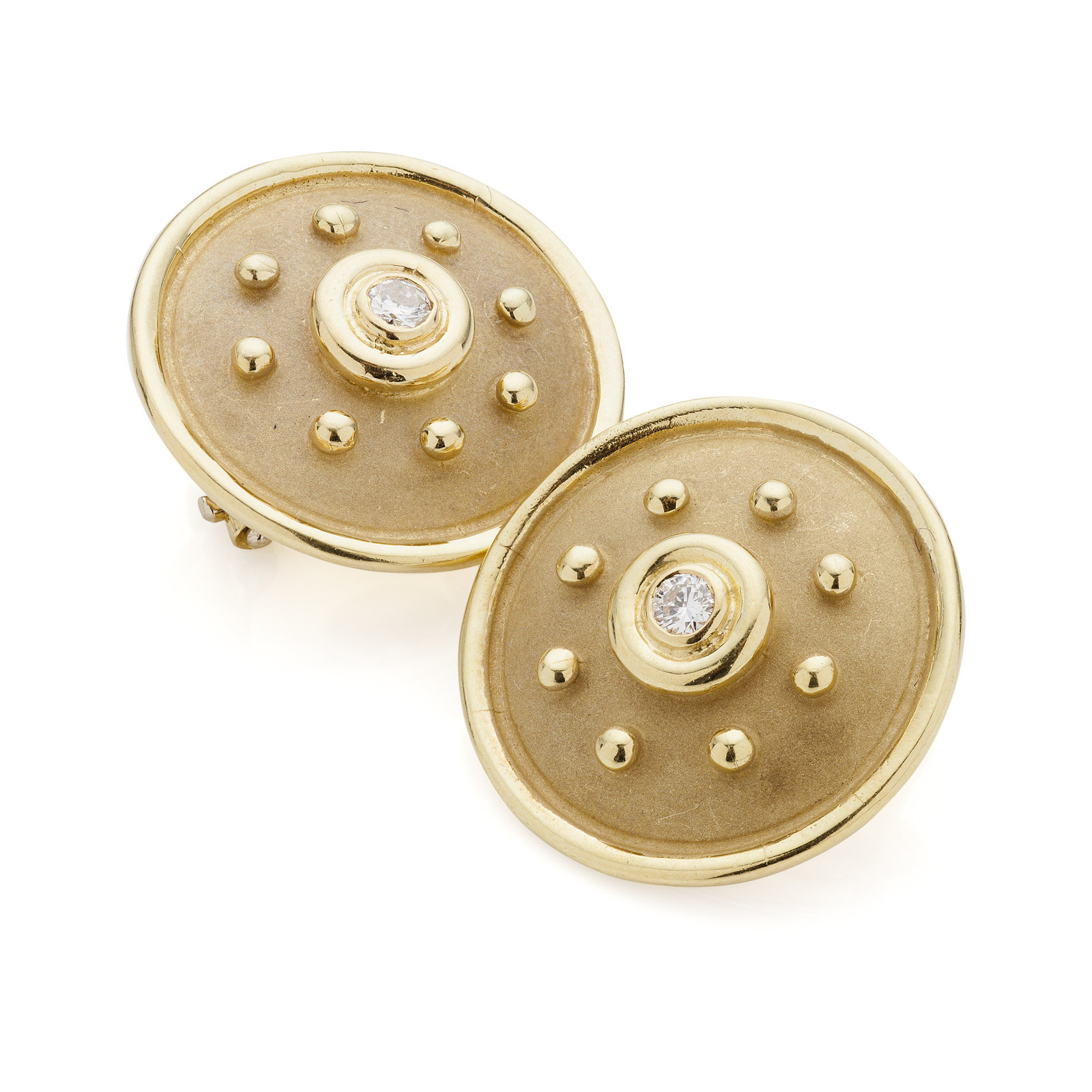 MAPPIN & WEBB - A pair of 18ct gold and diamond set ear clips