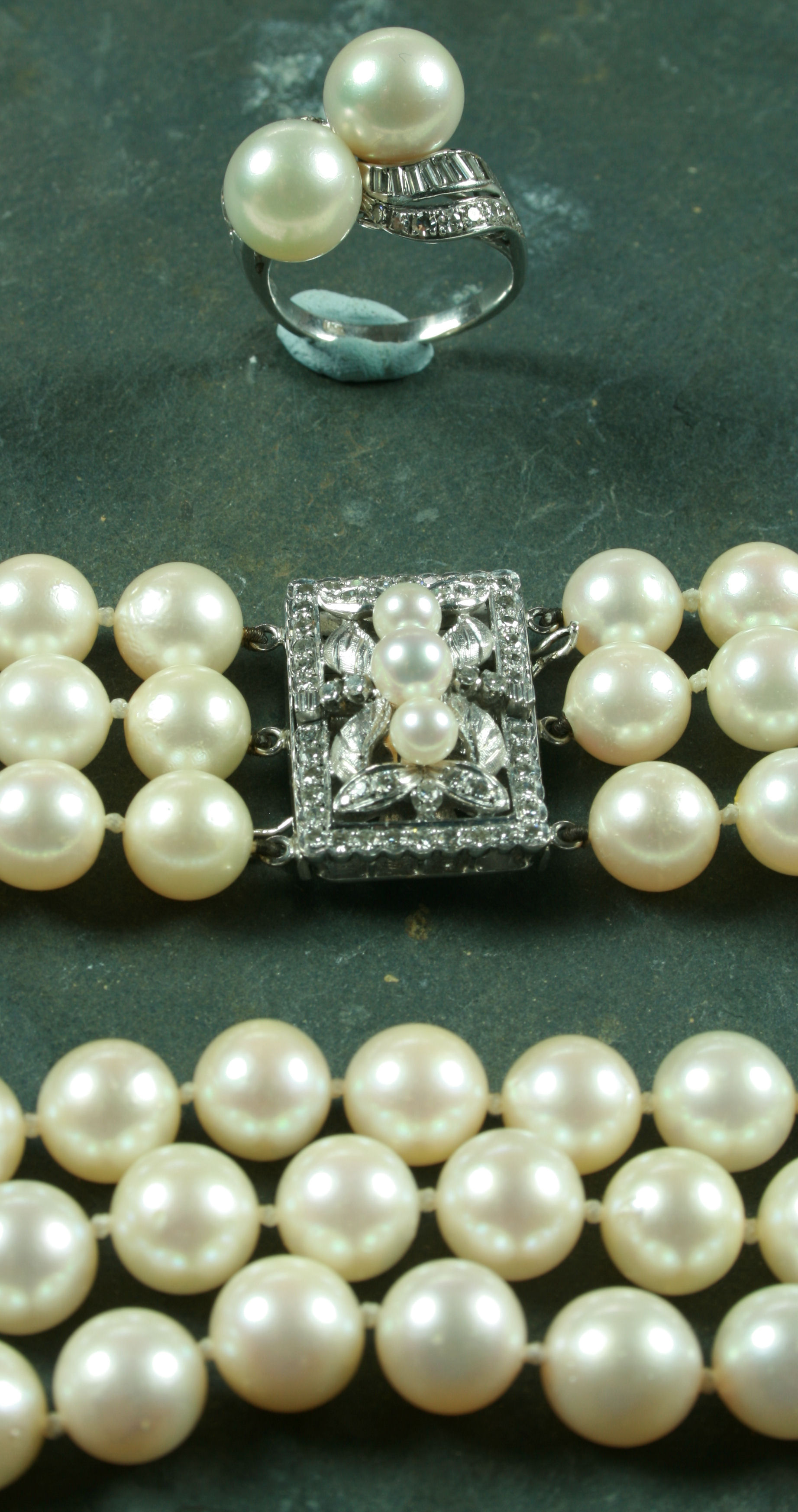 A large pearl and diamond cocktail ring,