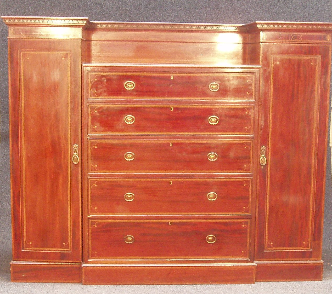 A Victorian mahogany breakfront compactum,