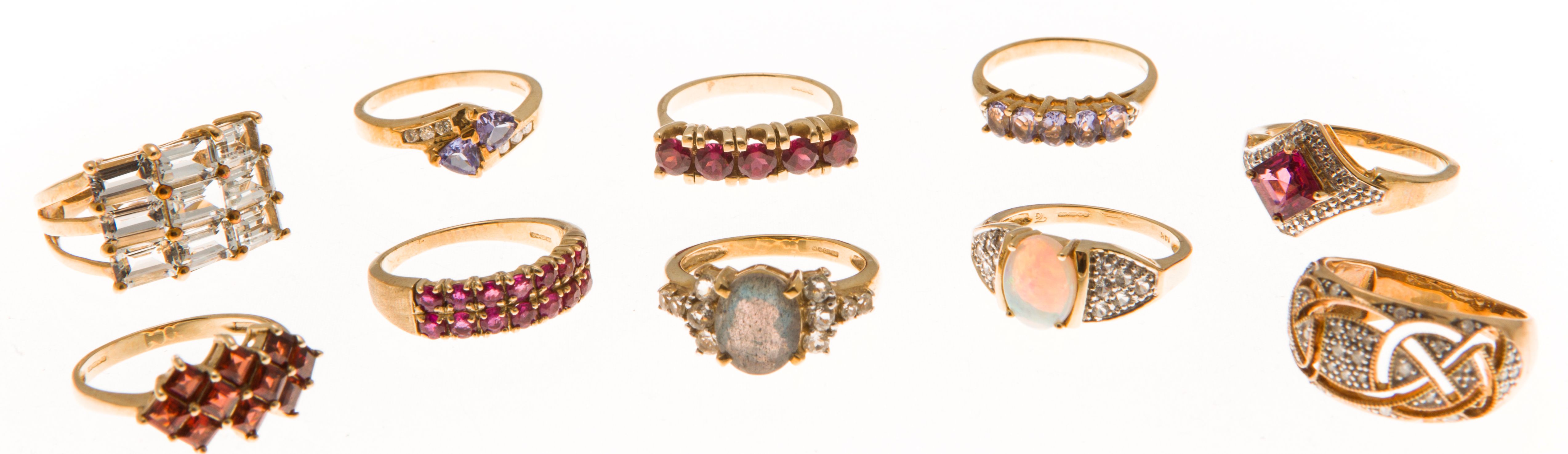 A large collection of gem set rings