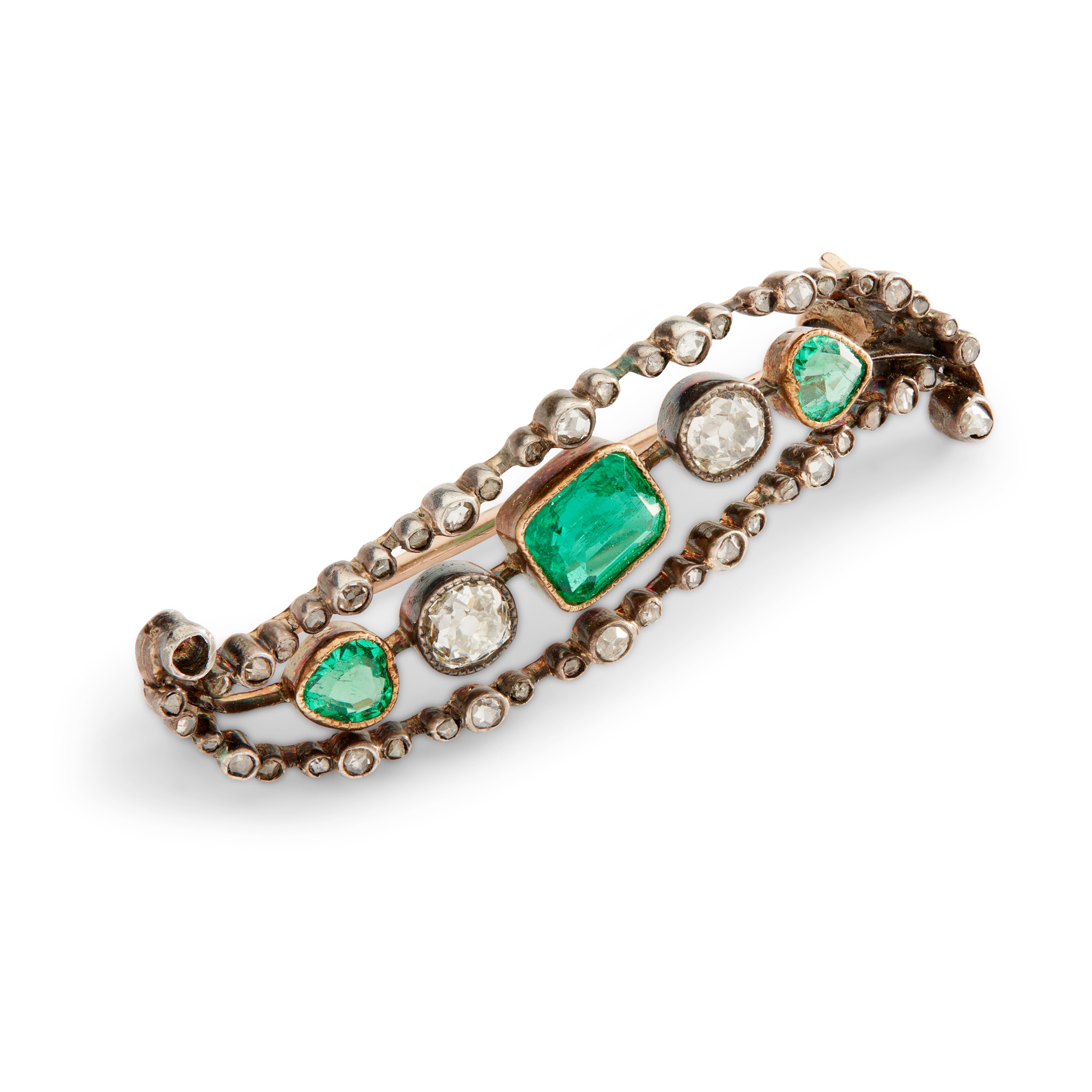 An emerald and diamond brooch