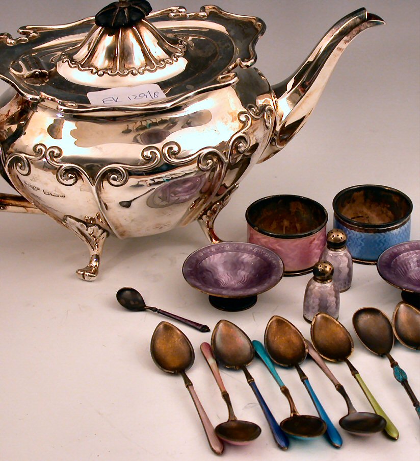 A cased set of six silver and mother of pearl buttons