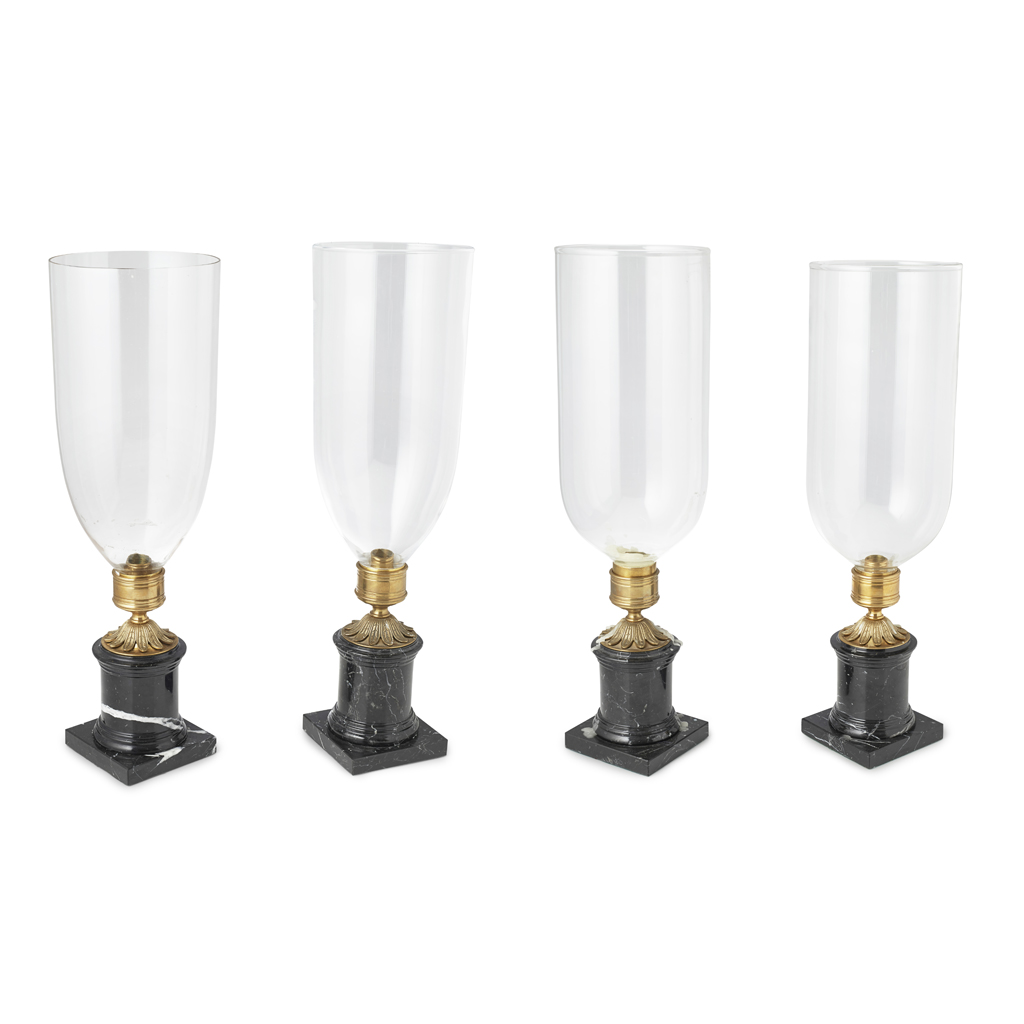 FOUR REGENCY STYLE MARBLE AND BRASS STORM LAMPS