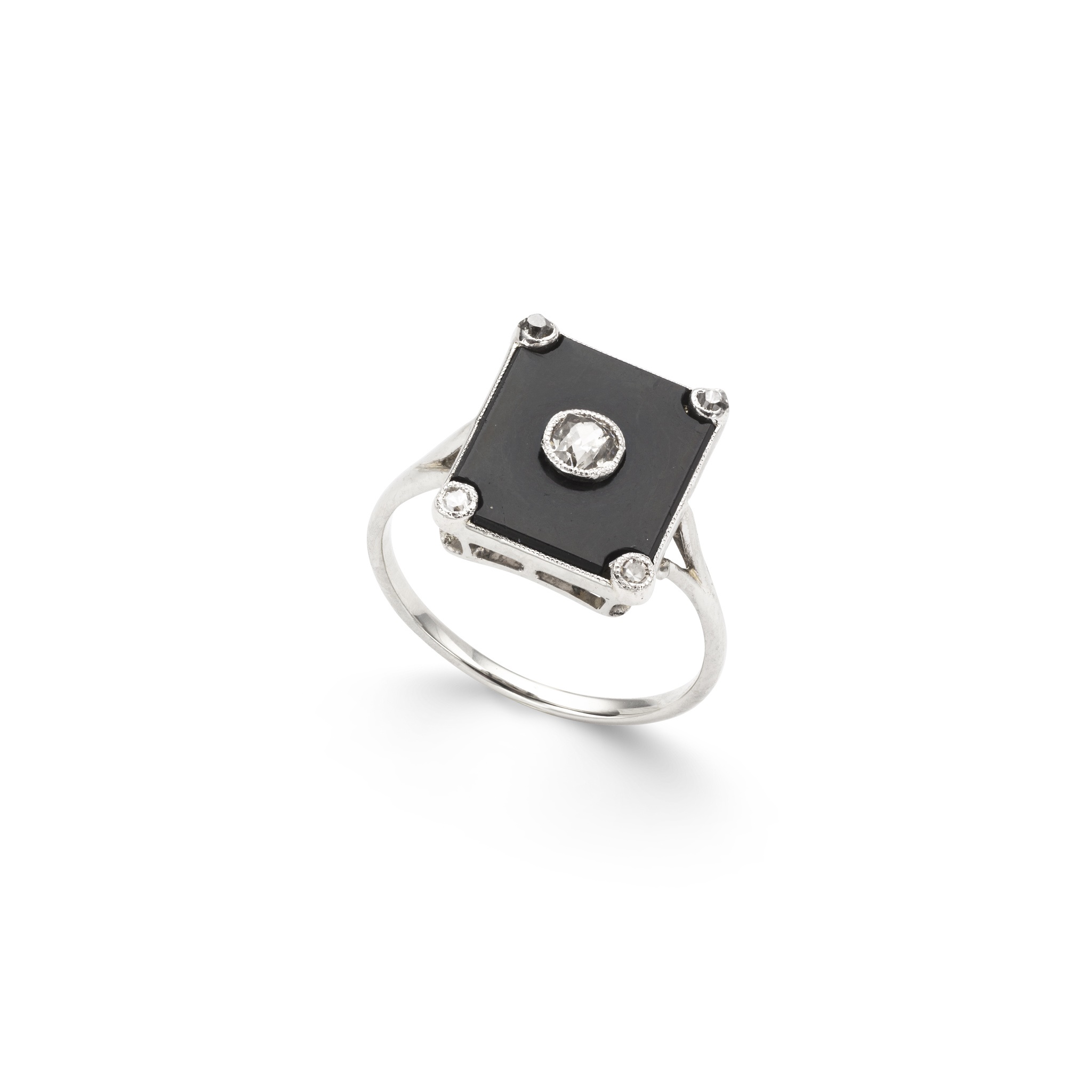 An early 20th-century onyx and diamond ring