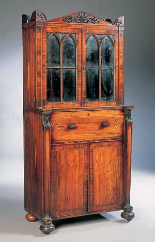A Regency rosewood secretaire cabinet