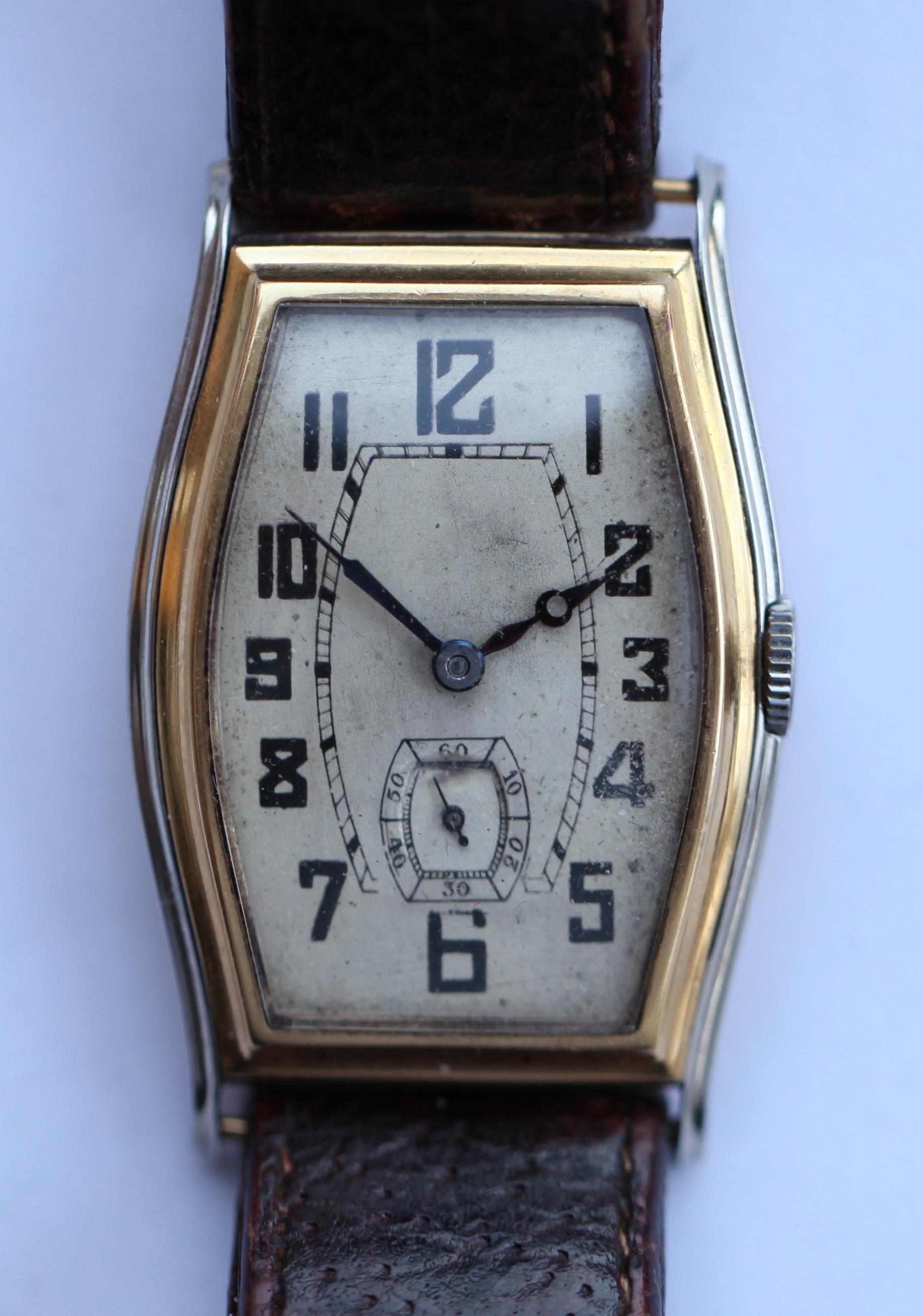 A gentleman's 18ct two colour gold 1940s wrist watch