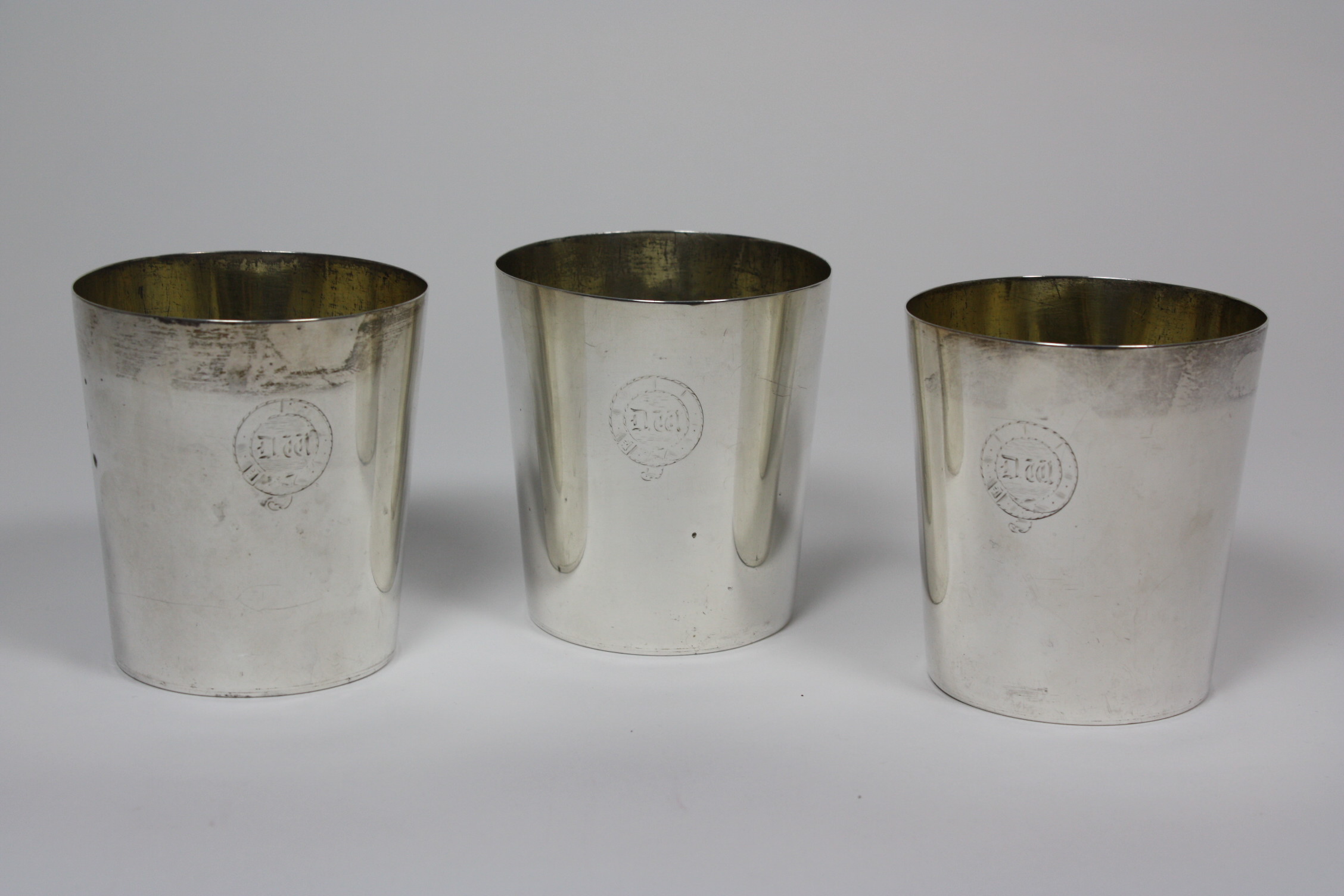 Three Victorian stacking beakers