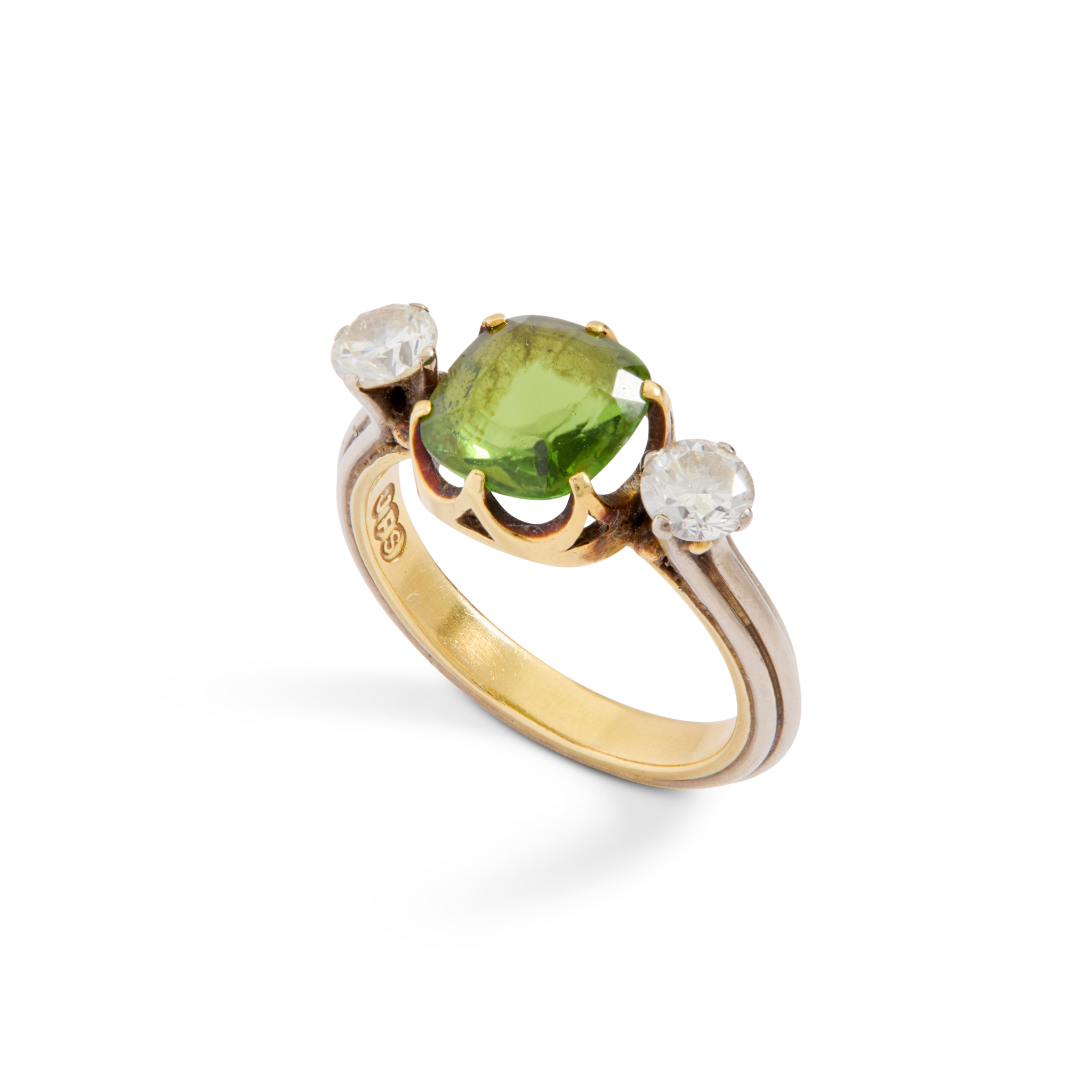 A green tourmaline and diamond three-stone ring
