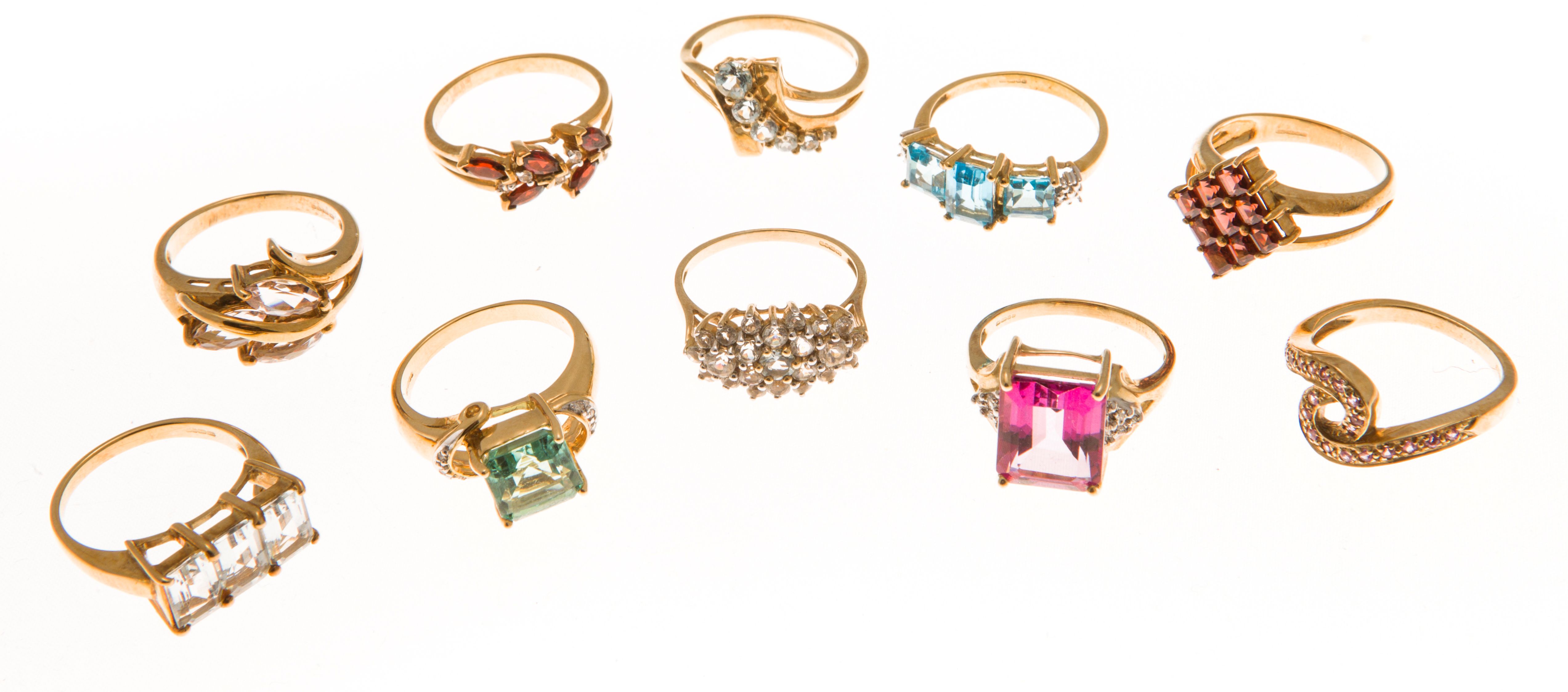 A collection of 9ct gold gem set rings