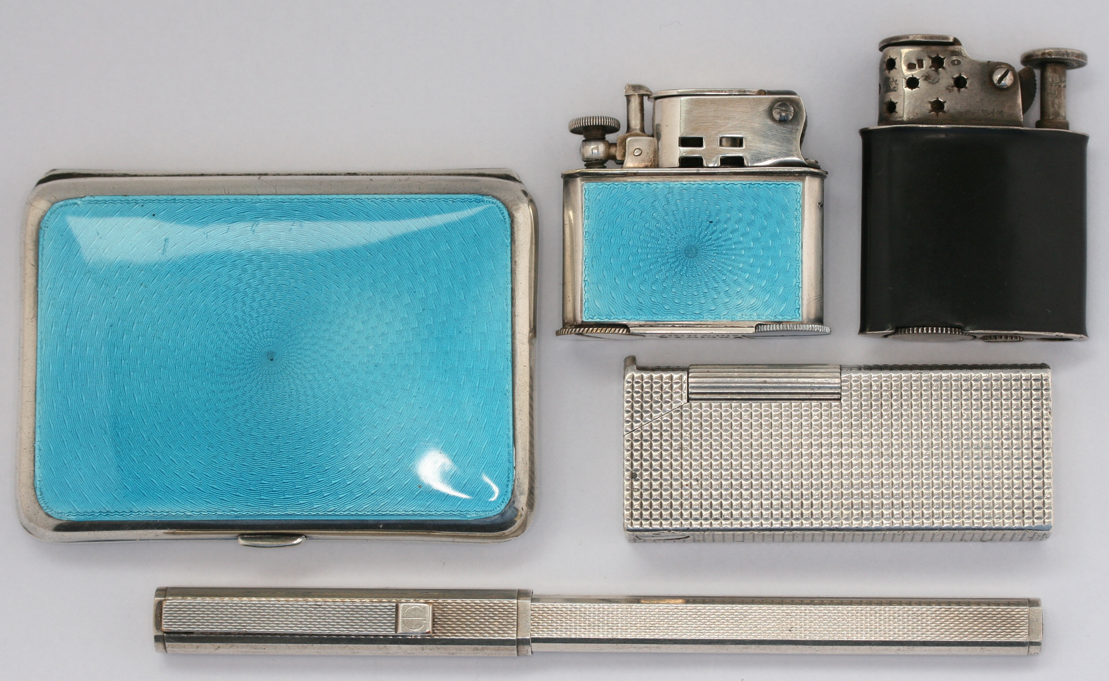 A silver Dunhill lighter