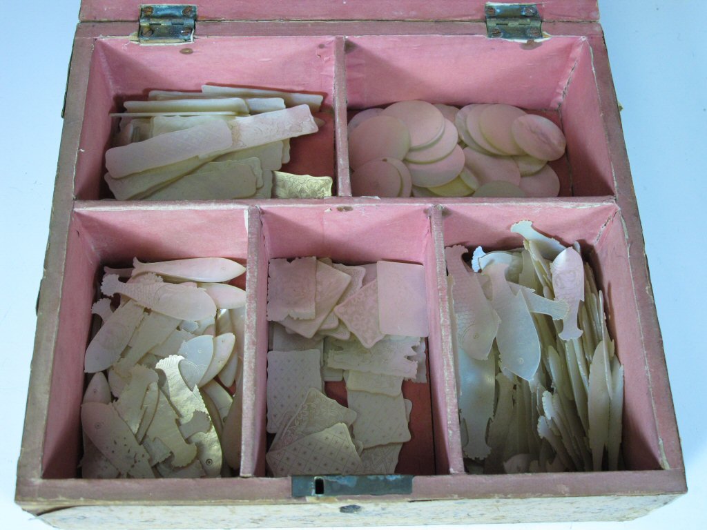 A large collection of 19th century Chinese mother of pearl gaming counters