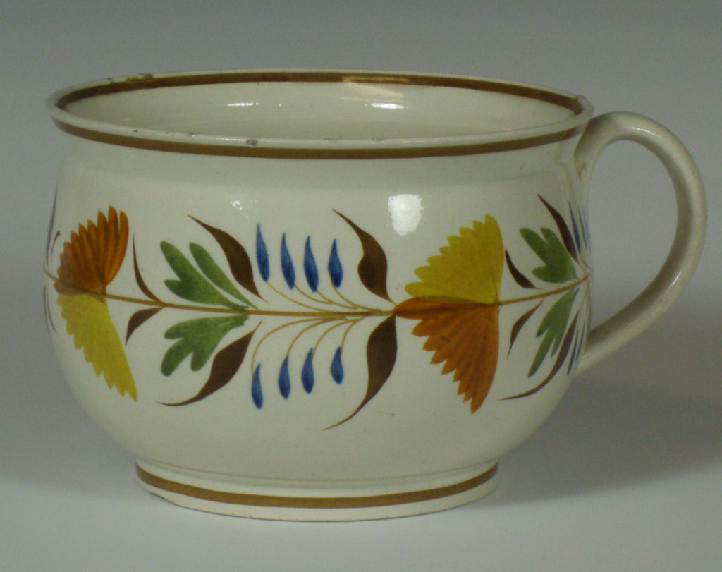 A large early 19th century creamware cup