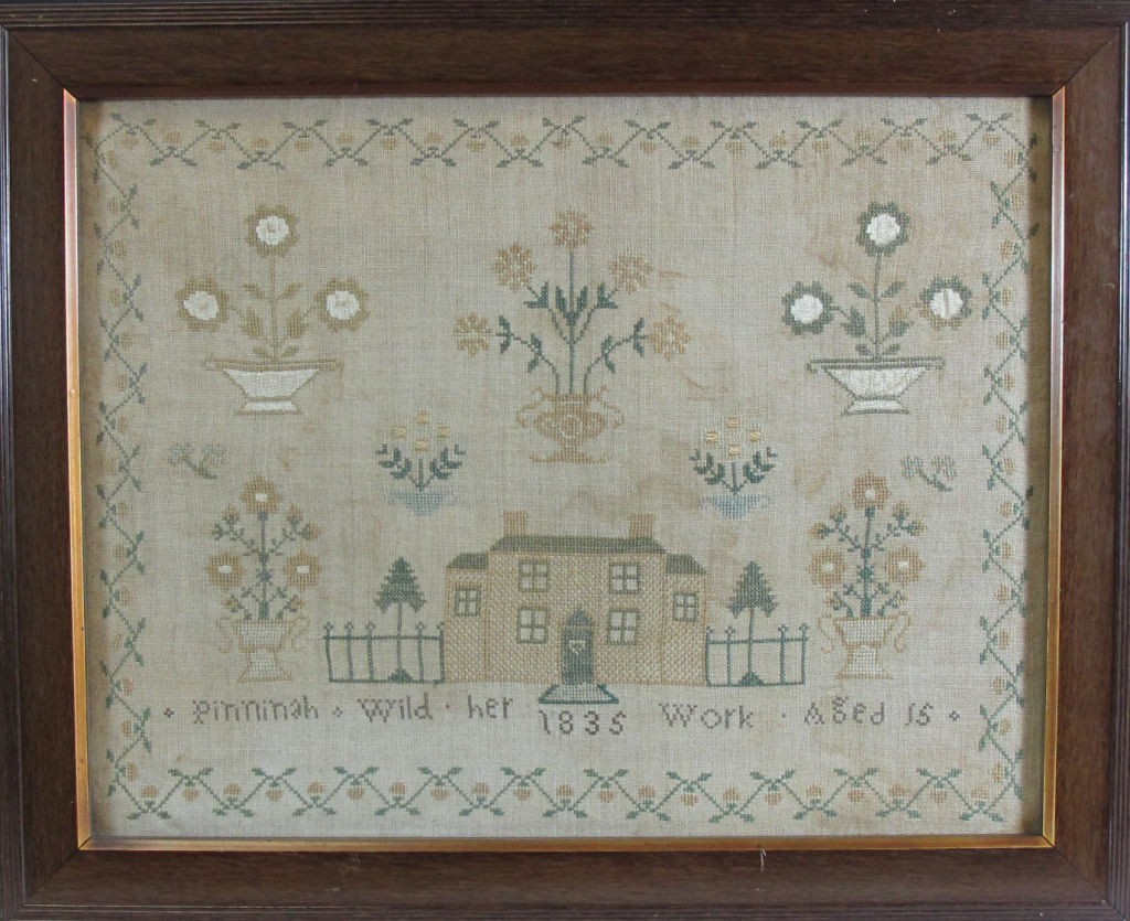 An early/mid 19th century sampler 'Pinninah Wild her 1835 work aged 15'