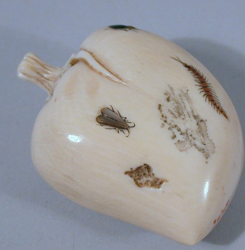 A Japanese carved ivory shibyama decorated plump bean
