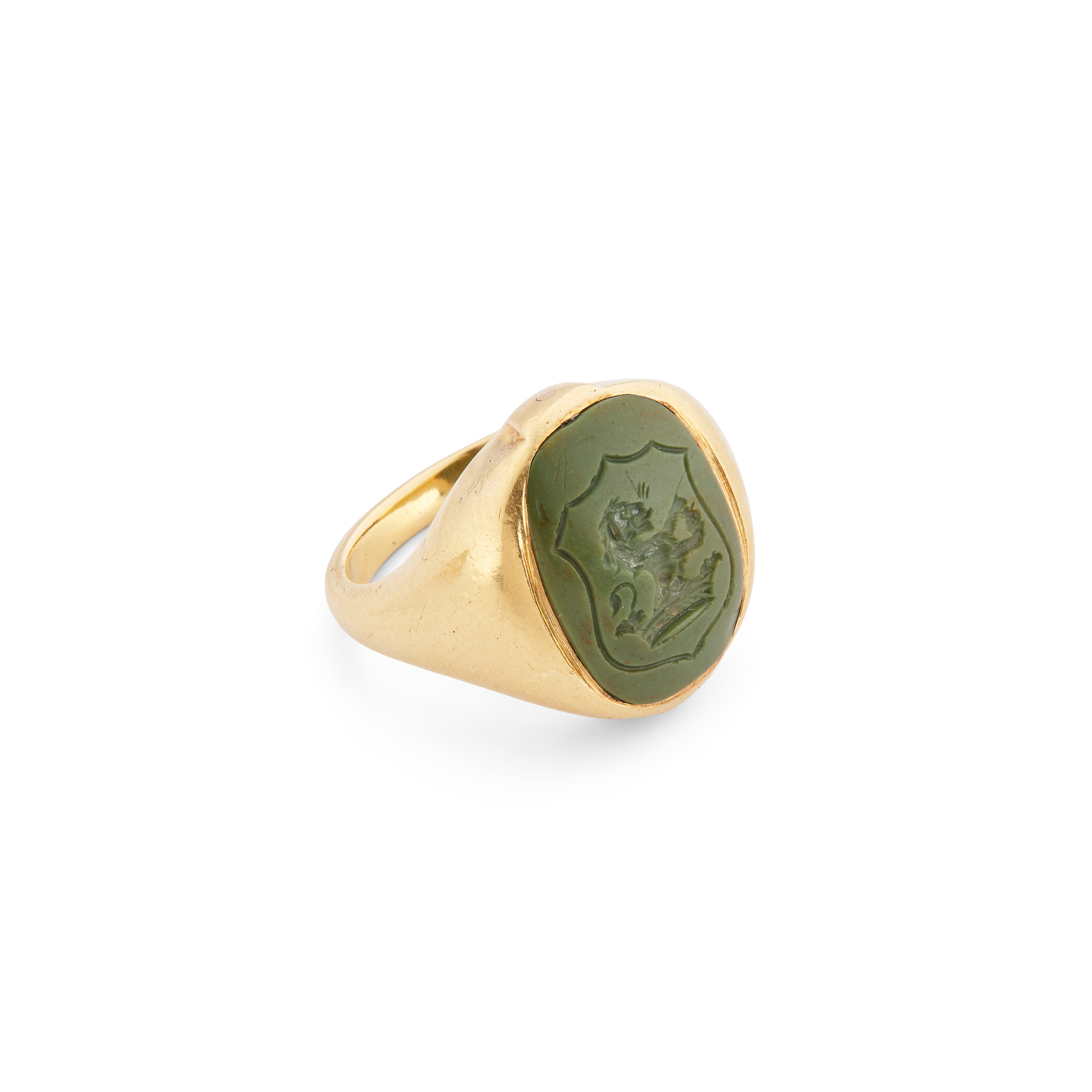 A green hardstone intaglio signet ring