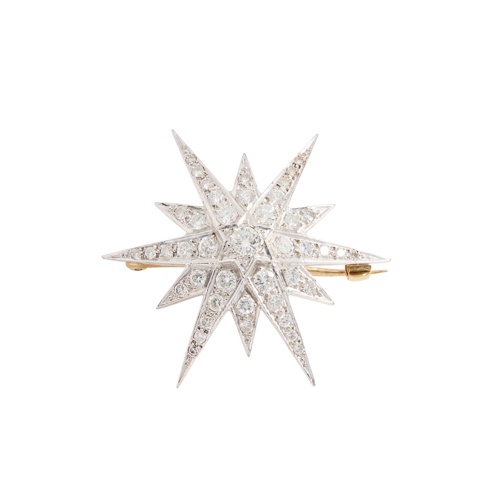 An 18ct gold diamond star brooch